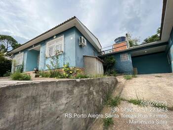 Casa em leilão - Rua Firmino Martins da Silva, 73 - Porto Alegre/RS - Banco Santander Brasil S/A | Z31766LOTE018