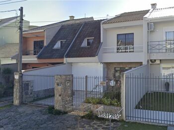 Casa em leilão - Rua Targino da Silva, 104 - Curitiba/PR - Banco Santander Brasil S/A | Z31977LOTE007