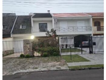 Casa em leilão - Rua Targino da Silva, 104 - Curitiba/PR - Banco Santander Brasil S/A | Z31977LOTE007