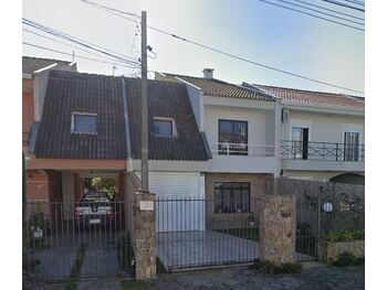 Casa em leilão - Rua Targino da Silva, 104 - Curitiba/PR - Banco Santander Brasil S/A | Z32678LOTE001